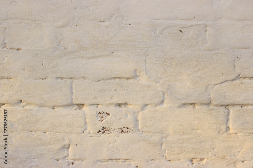 Obraz premium Photo of beige brickwork in sun glare