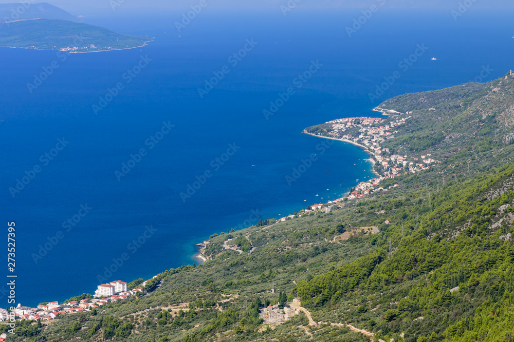 Aerial view of the coast. The coastline of the Adriatic sea in the town of Gradac, Dalmatia region, Croatia