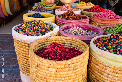 Colorful Eastern market. Baskets of spices on the market in Marrakech old town, Morocco