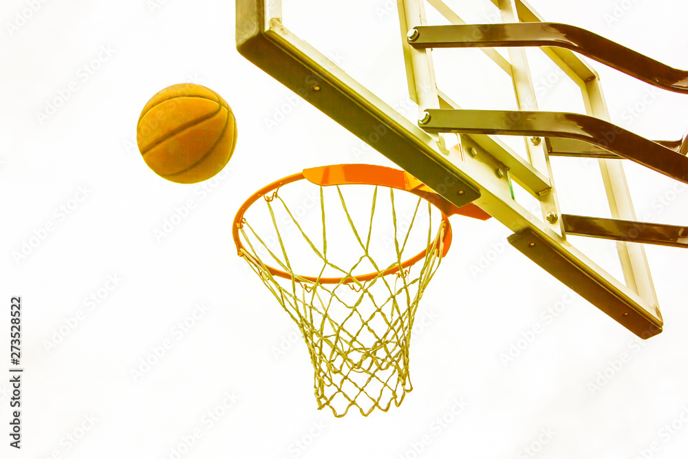 Basketball basket on the background of city houses. Street basketball.