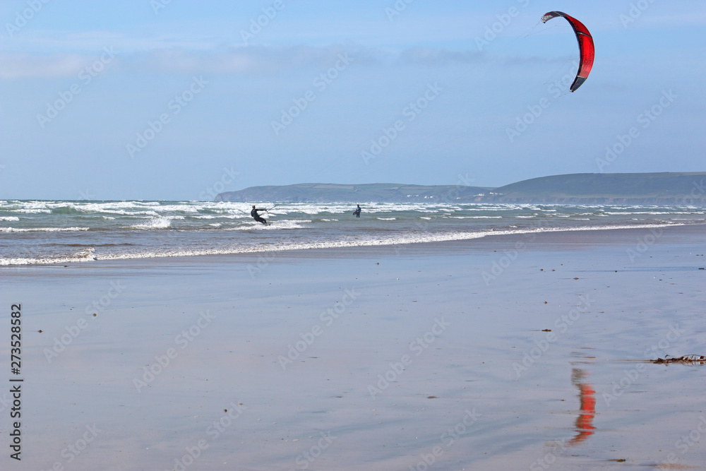 kitesurfer riding the surf