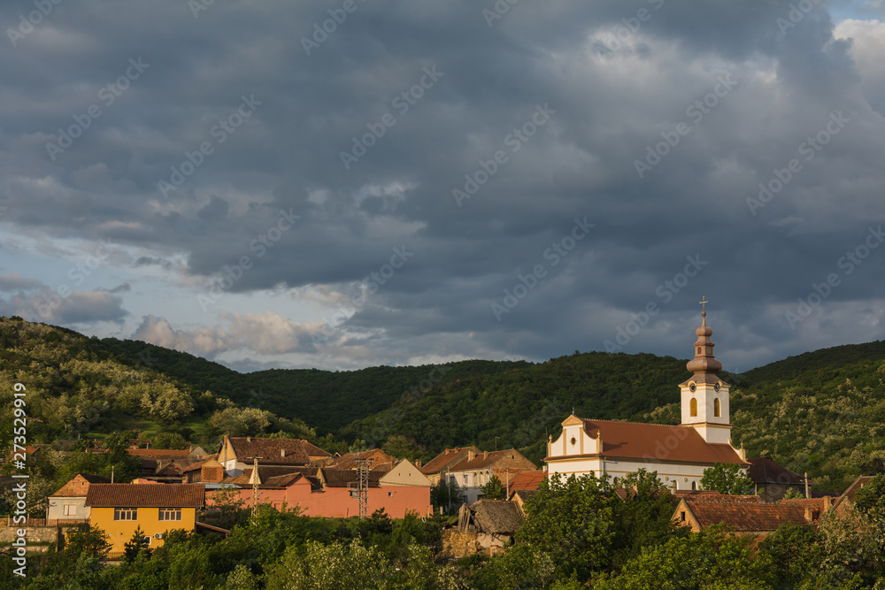 Small Romanian village in the Banat region in Vojvodina, Serbia in the early morning light