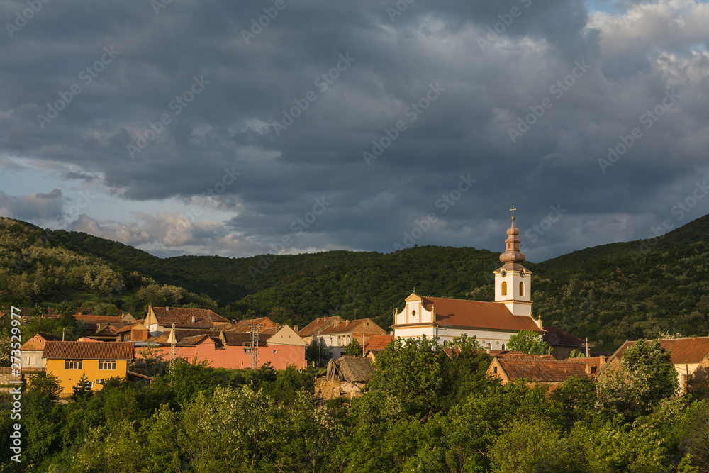 Small Romanian village in the Banat region in Vojvodina, Serbia in the early morning light