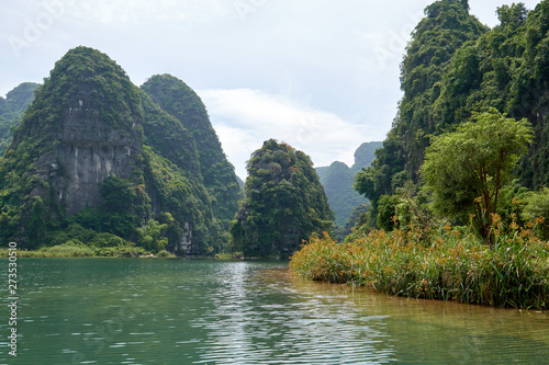 Landscape with karst mountains and river, Ninh Binh, Trang An, Vietnam. © vadim_ozz
