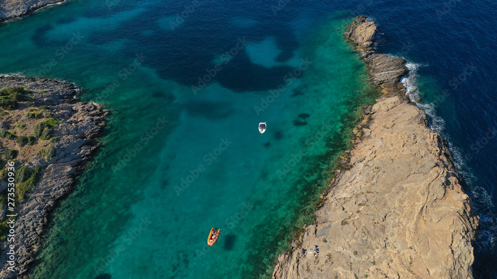 Aerial photo of tropical Caribbean bay with white sand beach and beautiful turquoise and sapphire clear sea