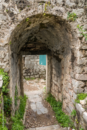 Fototapeta Naklejka Na Ścianę i Meble -  Stone walls of Kotor Fortress above the old town in Montenegro