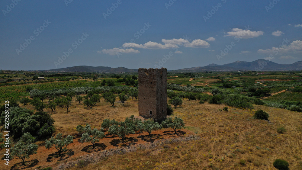 Aerial photo of famous stone medieval tower of Varabas near city of Markopoulo, Attica, Greece
