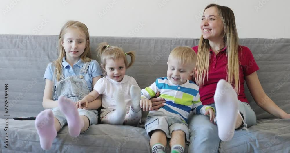 Happy family having fun on the sofa at home. Happy family having fun on the sofa at home.