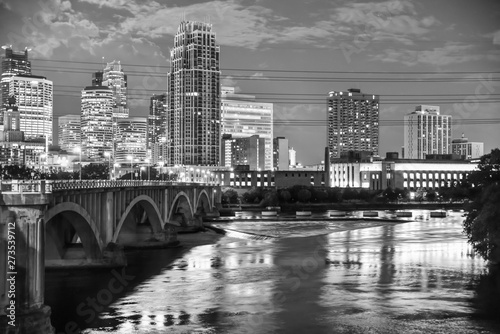 urban skyline along the river at night © BradleyWarren