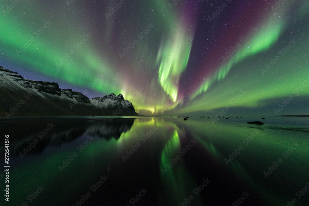 Northern light over Vestrahorn moutain , Iceland