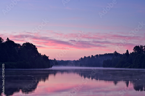 Early morning on the lake. The sky in Reds. Dawn. Fog © Uran Torpedonoscev