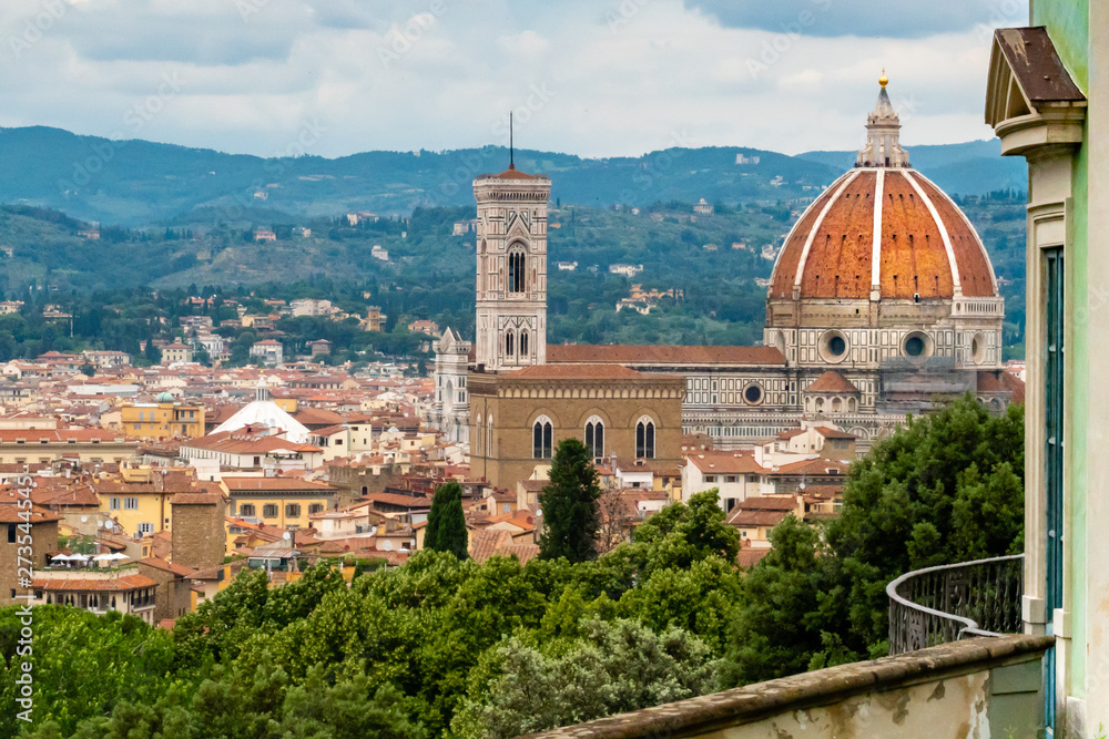 View of the Duomo, at the Florence Cathedral, as viewed from a nearby hillside. 