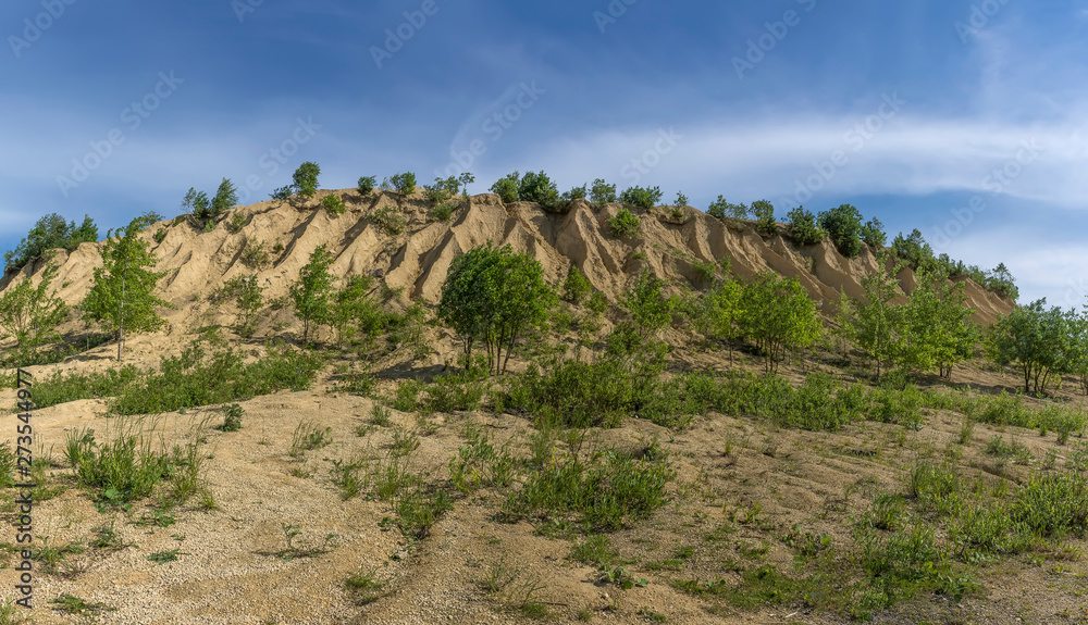 A mound formed by small piles of crushed limestone and washed away by rains.