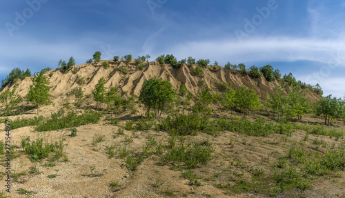 A mound formed by small piles of crushed limestone and washed away by rains.