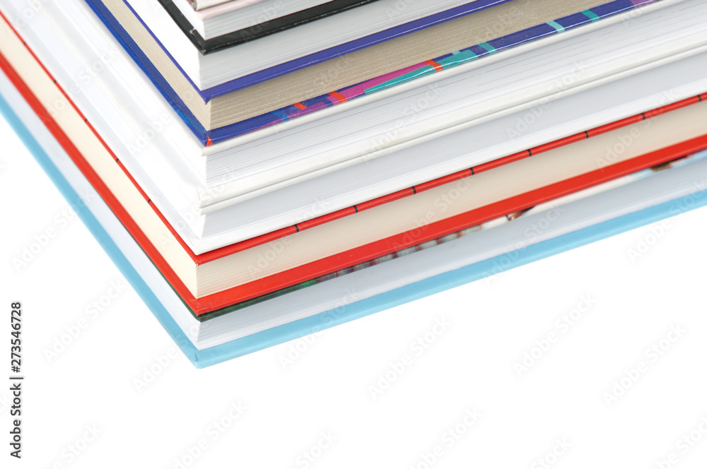 Books laid horizontally on a white background Books laid horizontally on a white background