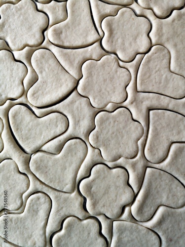 Heart and flower shaped dough for cookies - homemade dessert - cooking at home