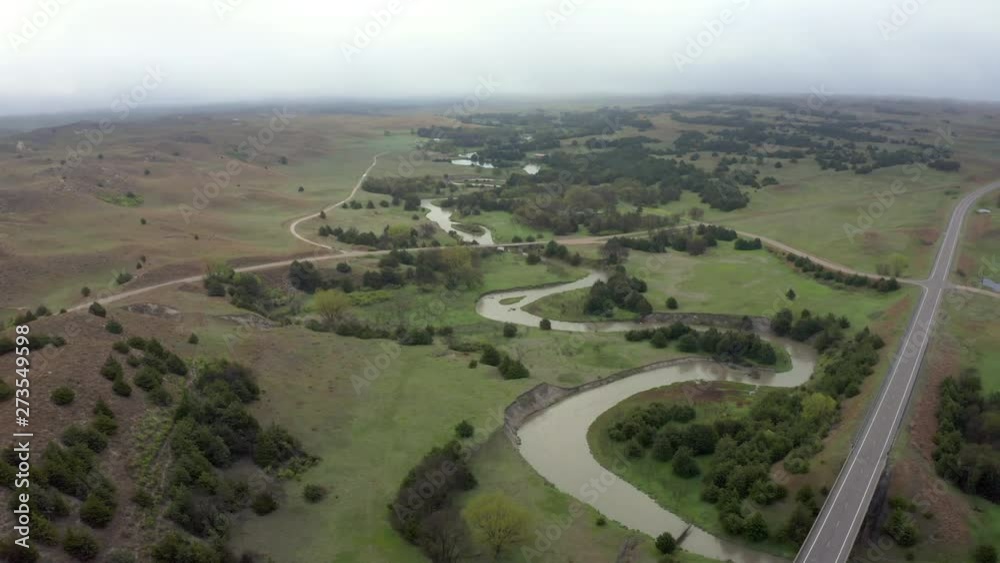 aerial view of the Dismal River in Nebraska Sandhills near Thedford, foggy spring morning aerial view of the Dismal River in Nebraska Sandhills near Thedford, foggy spring morning