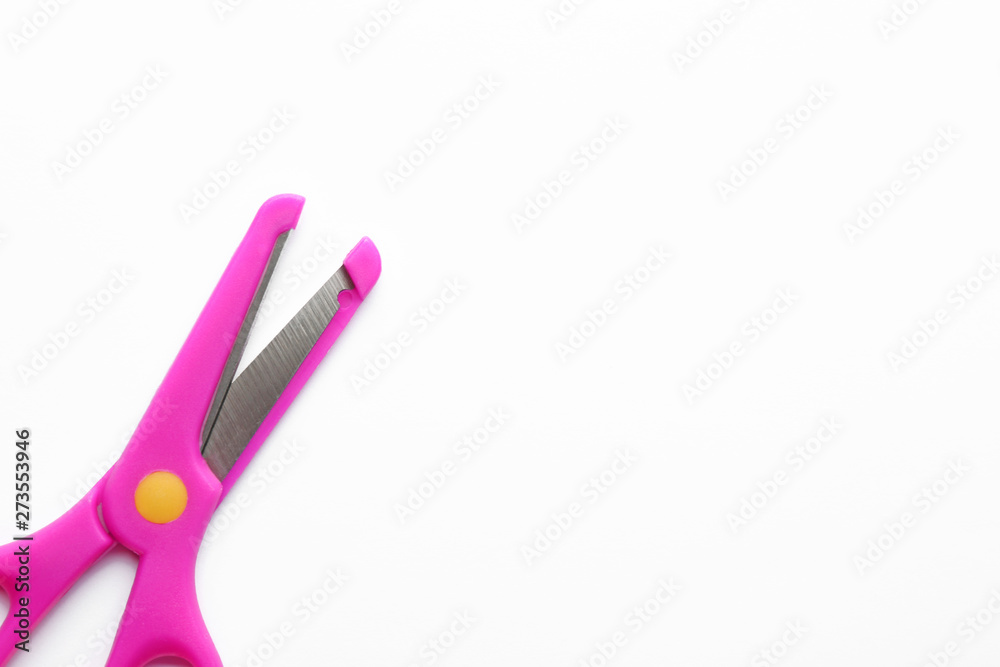 Pair of training scissors on white background Pair of training scissors on white background