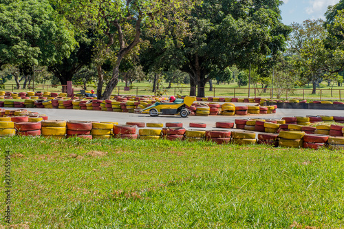Child playing kart on the city race track.