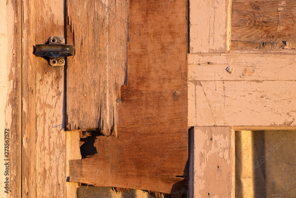 Old weathered wood door with latch. Old weathered wood door with latch.