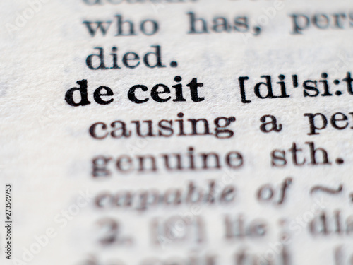 Fotografia, Obraz Dictionary definition of word deceit. Selective focus.
