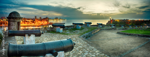 panoramic view of the city of habana and its bay seen from the castle of morro at nightfall © javier