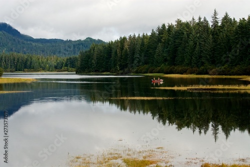 Fototapeta Naklejka Na Ścianę i Meble -  Fishing in a boat inside a lake in nature nice landscape Alaska
