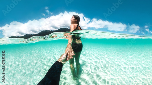 Couple relaxing under water beautiful ocean at Koh Lipe Beach Thailand ,Summer vacation photo