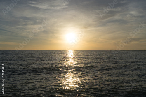 Beautiful seascape with orange sunset.