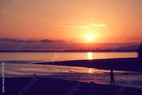 Beautiful seascape with orange sunset.