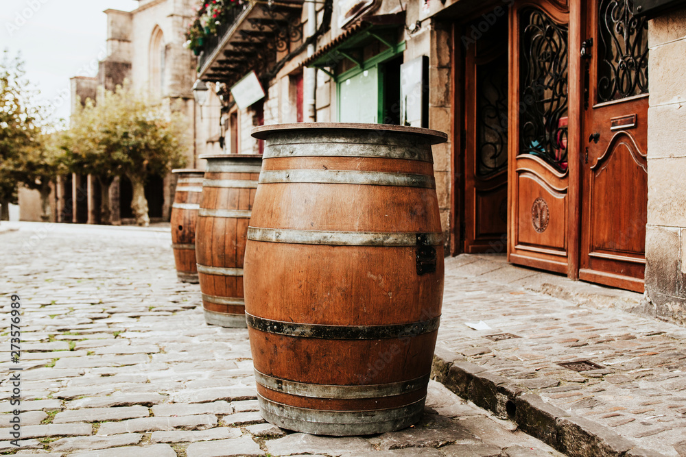 wooden barrel table at a bar or pub in the city wooden barrel table at a bar or pub in the city