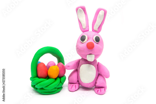 Play dough rabbit on white background. Handmade clay plasticine