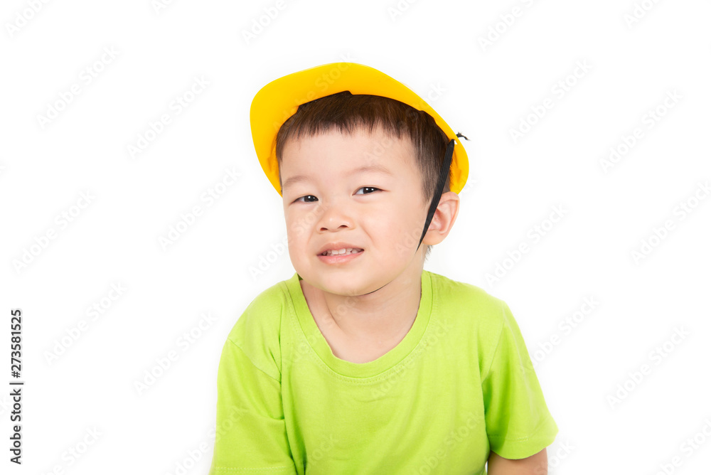 Little Asian toddler boy playing wood blocks wear helmet engineer Little Asian toddler boy playing wood blocks wear helmet engineer