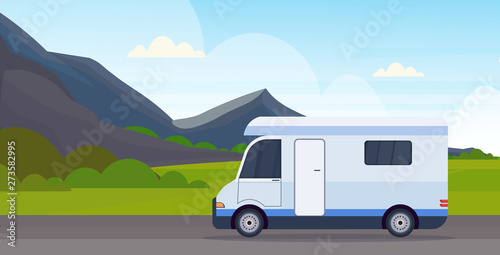 caravan car traveling on highway recreational travel vehicle camping concept beautiful nature mountains landscape background flat horizontal © mast3r