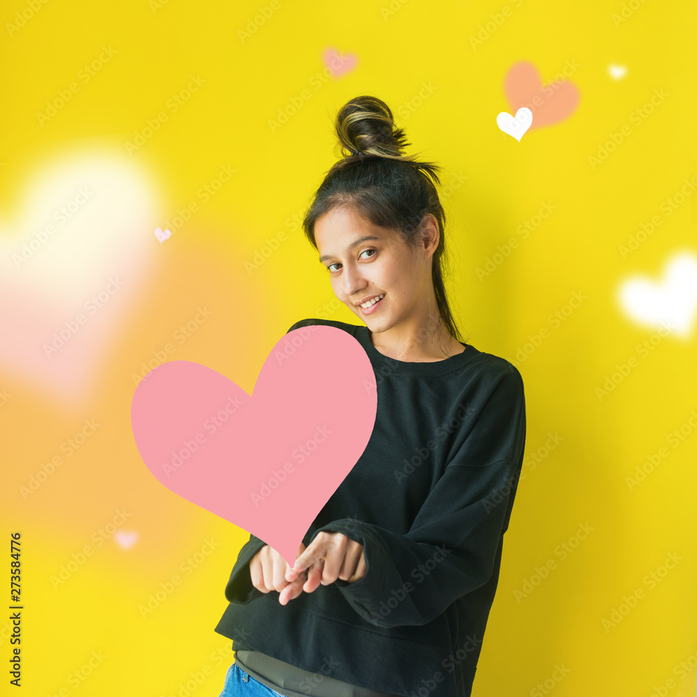 Cheerful young girl showing hands finger together Cheerful young girl showing hands finger together