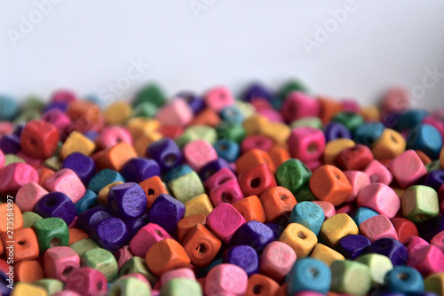 Perspective view of colourful wooden beads.