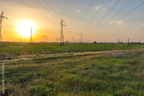 Sunset Landscape of High-voltage power lines in the land around city of Plovdiv, Bulgaria