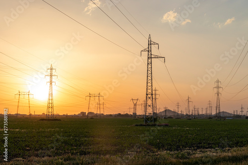 Sunset Landscape of High-voltage power lines in the land around city of Plovdiv, Bulgaria