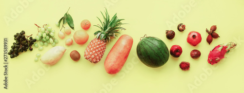 Rainbow from different tropical fruits and berries