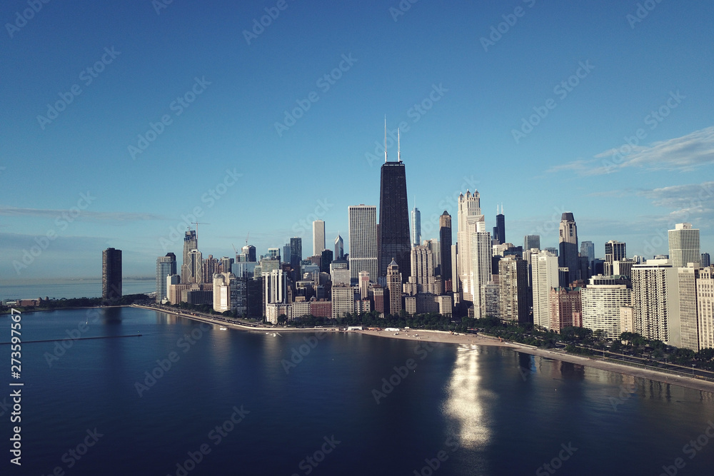 panorama of Chicago from the height and lake Michigan, skyscrapers morning sun