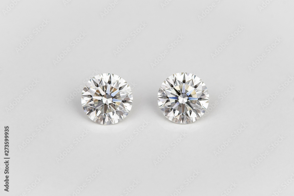 Fototapeta premium Carat size diamonds on white isolated