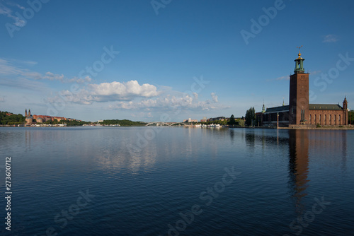 Boats, pier and landmarks in Stockholm a tranquil morning, 