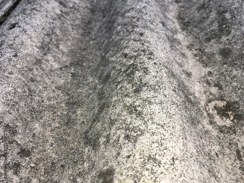 fragment of undulating slate covering of the building