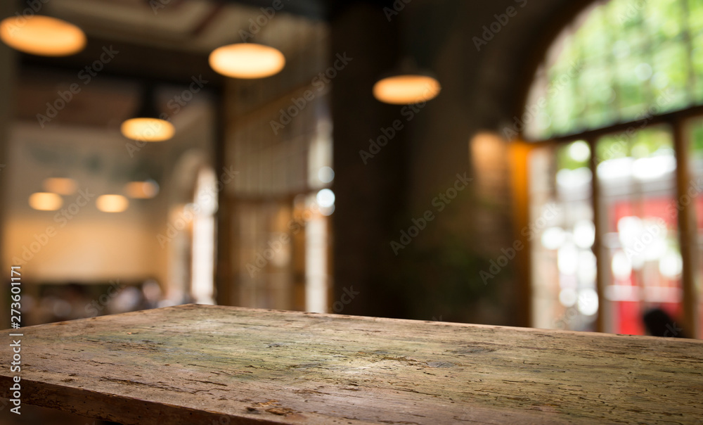 blurred background of bar and dark brown desk space of retro wood blurred background of bar and dark brown desk space of retro wood