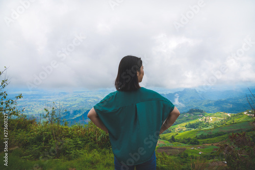 Young girl hipster backpack women travelling looking at beautiful sky mountains scenery views 