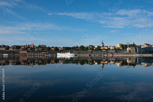 Boats  pier and landmarks in Stockholm a tranquil morning  