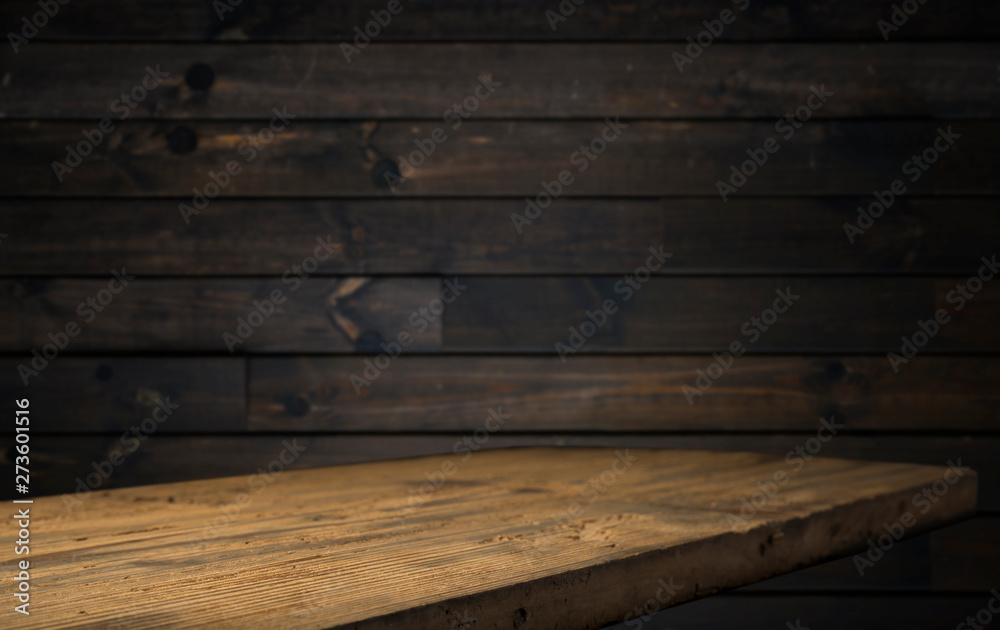 image of wooden table in front of abstract blurred background of resturant lights image of wooden table in front of abstract blurred background of resturant lights