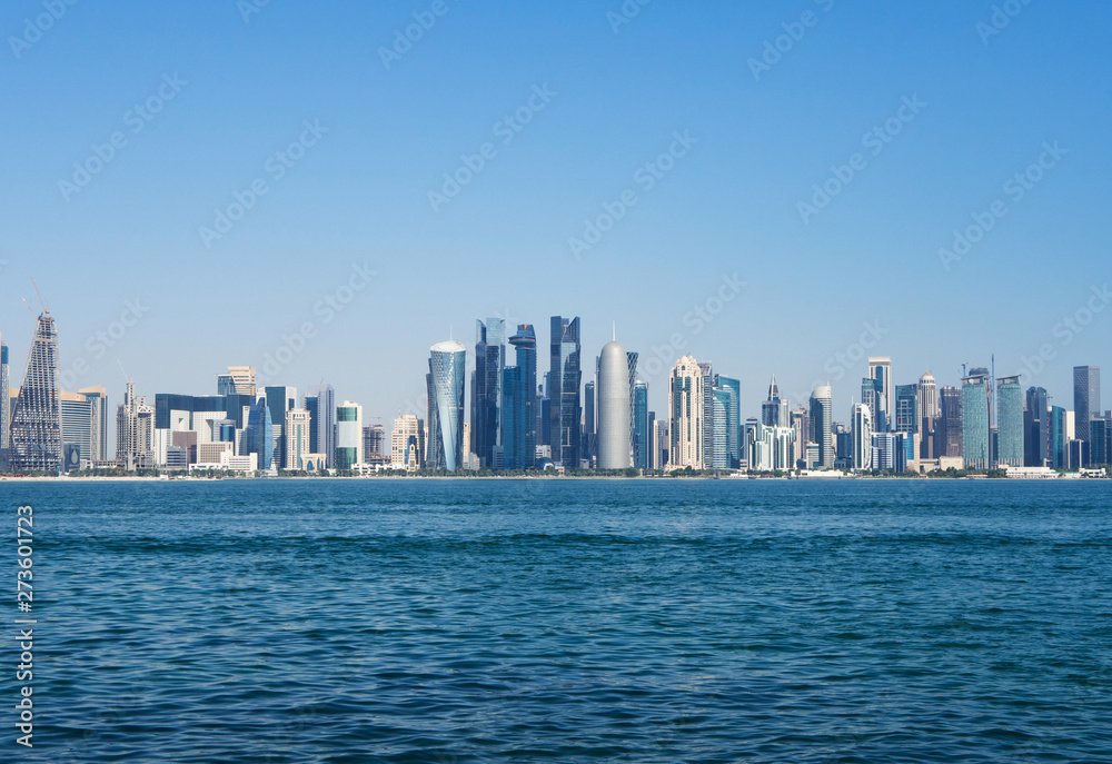 Fototapeta premium Doha skyline with skyscrapers and waterfront. Concept of finance luxury world