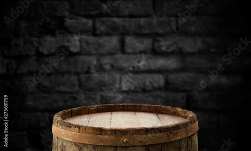 background of barrel and worn old table of wood