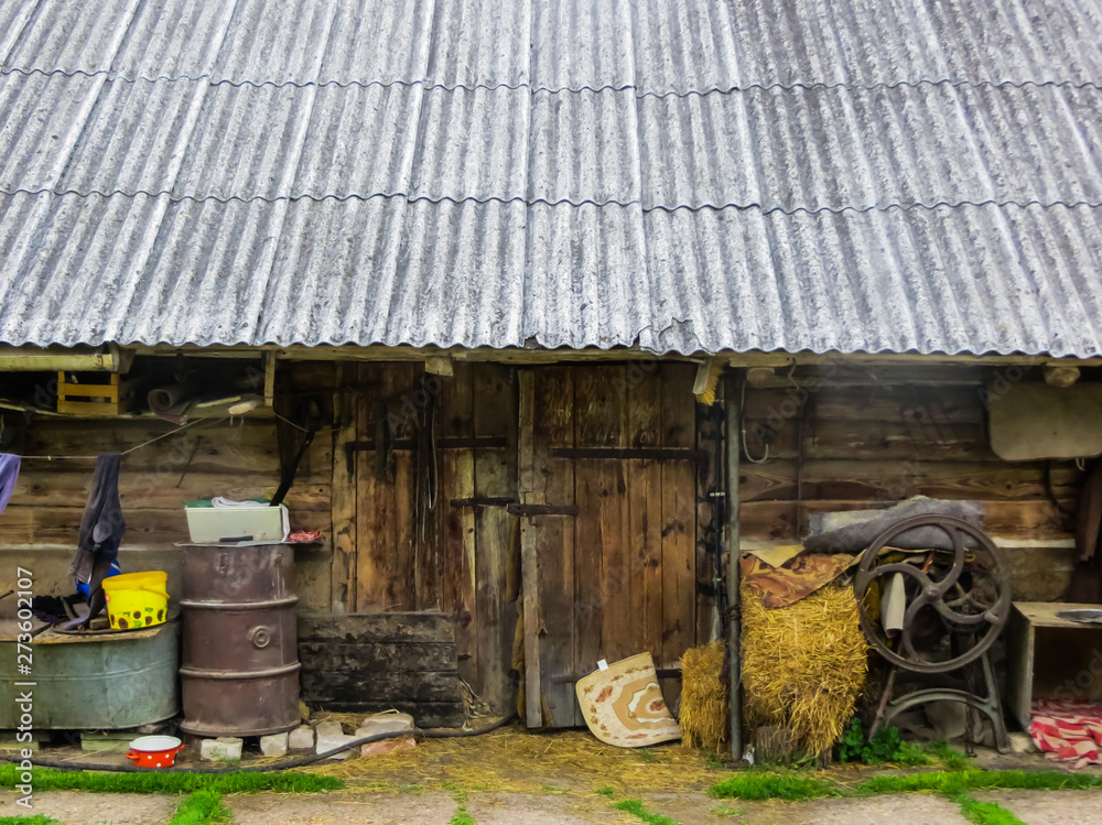 Old traditional abandoned buildings in the village.Country life. Old traditional abandoned buildings in the village.Country life.